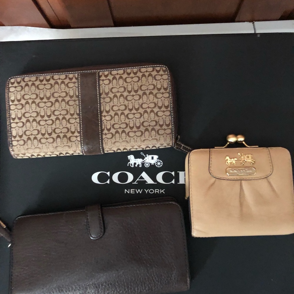 Lot of three used Coach wallets